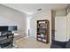 Cozy bedroom with a work station and decorative bookcase at 1791 Hackberry St, Clermont, FL 34715