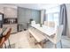 Stylish dining area with modern table setting, elegant seating, and decor at 1791 Hackberry St, Clermont, FL 34715