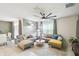 Spacious living room offers ample seating, natural light, and modern decor, perfect for relaxation at 1791 Hackberry St, Clermont, FL 34715