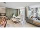 Open concept living space with modern dining set and comfortable seating area, great for entertaining at 1791 Hackberry St, Clermont, FL 34715
