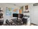 Bright office space with hardwood floors, world map, and natural light at 1791 Hackberry St, Clermont, FL 34715