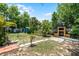 Expansive backyard featuring a brick oven and ample space for outdoor activities at 1872 Wayside Dr, Orlando, FL 32818