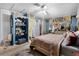 Cozy bedroom featuring tile floors, ornate curtains, and a decorative vanity area at 1872 Wayside Dr, Orlando, FL 32818