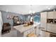 Spacious kitchen with center island, white cabinetry, tile floors, and eat-in kitchen table at 1872 Wayside Dr, Orlando, FL 32818