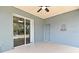 Covered back porch with sliding doors leading to the backyard at 1947 Vienna Ave, Deltona, FL 32725
