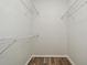 Walk-in closet with built-in shelving for optimal storage at 1947 Vienna Ave, Deltona, FL 32725