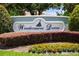 Entrance sign for Windermere Downs, a beautifully landscaped community at 2009 Woody Dr, Windermere, FL 34786