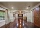 Open living area with hardwood floors, decorative columns, and natural light at 2009 Woody Dr, Windermere, FL 34786