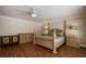 Spacious main bedroom features hardwood floors, neutral walls, and ample closet space at 2009 Woody Dr, Windermere, FL 34786