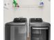 Well-equipped laundry room features a modern, front-load washer and dryer set at 221 Sterling Springs Ln, Altamonte Springs, FL 32714