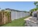 Backyard with privacy fence, shed, and grassy area for recreation at 232 E Grant St, Orlando, FL 32806