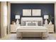 Inviting bedroom with a plush bed, side tables, decor lamps, and a serene ambiance at 2337 White Buffalo St, Apopka, FL 32703