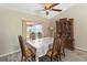 Bright dining area with sliding glass doors provides seamless indoor-outdoor living at 2407 Accord Ter, Kissimmee, FL 34758