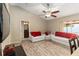 Bright living room featuring vaulted ceilings and a neutral color palette with an adjacent bathroom at 2407 Accord Ter, Kissimmee, FL 34758