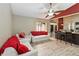 Open floorplan living room and kitchen area with updated wood flooring and breakfast bar seating at 2407 Accord Ter, Kissimmee, FL 34758