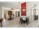 Open floor plan connecting the dining and living spaces creates an inviting atmosphere at 2407 Accord Ter, Kissimmee, FL 34758
