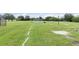 A large grassy recreational field with soccer goals and space for various activities at 2407 Accord Ter, Kissimmee, FL 34758