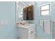 Bright bathroom showcasing a modern vanity, updated fixtures, and fresh ambiance at 2562 Sheffield Dr, Deltona, FL 32738