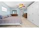 Comfortable bedroom with tile flooring, ample storage, and soft natural light at 2562 Sheffield Dr, Deltona, FL 32738
