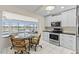 Bright breakfast nook with stainless steel appliances, and waterfront view at 2562 Sheffield Dr, Deltona, FL 32738