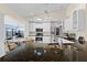 Modern kitchen with stainless steel appliances and a breakfast nook overlooking the water at 2562 Sheffield Dr, Deltona, FL 32738