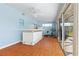 Entertainer's delight with bar, exercise bike, tile floor, and sliders to screened porch at 2562 Sheffield Dr, Deltona, FL 32738