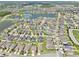 Aerial view of community, with the amenity center pond nearby at 2598 Trielle Ave, Kissimmee, FL 34741