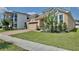 Charming home with brick driveway, two car garage, and well maintained landscaping at 2598 Trielle Ave, Kissimmee, FL 34741