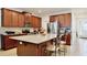 Spacious kitchen island with granite countertops, stainless steel appliances, and lots of cabinets at 2598 Trielle Ave, Kissimmee, FL 34741