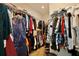 Walk-in closet with organized shelving and ample storage for clothing and accessories at 2598 Trielle Ave, Kissimmee, FL 34741