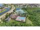 Aerial view of the community amenities including a playground, pool, and tennis courts at 3018 Bargate St, Orlando, FL 32824