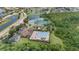 Aerial view of the community amenities including a playground, pool, and tennis courts at 3018 Bargate St, Orlando, FL 32824