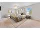 Spacious bedroom with a large bed, natural light, and a calming color palette at 3018 Bargate St, Orlando, FL 32824