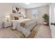 Inviting bedroom with a serene ambiance, soft bedding, and a window view at 3018 Bargate St, Orlando, FL 32824