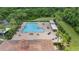 Aerial view of the neighborhood pool and patio area with palm trees for shade at 3018 Bargate St, Orlando, FL 32824