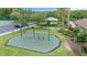 An aerial view shows a playground with swings, a covered play area, and landscaping at 3018 Bargate St, Orlando, FL 32824