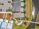 Aerial view of home highlighting lot size, in-ground pool and proximity to the lake at 3020 Parrot Head Pl, Kissimmee, FL 34747