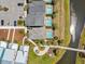 Aerial view showcasing the home's in-ground pool, and landscaped outdoor space at 3020 Parrot Head Pl, Kissimmee, FL 34747