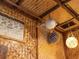 Themed room with bamboo walls, pirates decor, and hanging pufferfish light at 3020 Parrot Head Pl, Kissimmee, FL 34747