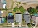 Enjoy an aerial view of the property with nearby swimming pools and well-kept landscapes, showcasing community amenities at 3029 Bransbury Ct, Kissimmee, FL 34747