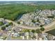 A high angle shot of the home in a well-planned community near a pond and green spaces at 3029 Bransbury Ct, Kissimmee, FL 34747