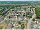 Overhead image of a home in a well-planned neighborhood near various ponds and lush green spaces at 3029 Bransbury Ct, Kissimmee, FL 34747