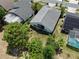 Aerial shot of the home's backyard with lush greenery and well-maintained surroundings at 3029 Bransbury Ct, Kissimmee, FL 34747