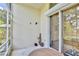 This covered lanai offers a pleasant outdoor space with sliding glass doors and access to the backyard at 3029 Bransbury Ct, Kissimmee, FL 34747