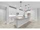 Bright kitchen featuring white cabinets, granite countertops, and ample storage at 30369 Apricot Ave, Eustis, FL 32736
