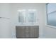 Bathroom featuring double vanity with granite countertop at 3128 Stonehurst Cir, Kissimmee, FL 34741