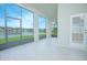 Enclosed lanai with lake view at 3128 Stonehurst Cir, Kissimmee, FL 34741