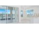 Bright and airy living space with sliding glass doors leading to a screened patio and backyard views at 3128 Stonehurst Cir, Kissimmee, FL 34741