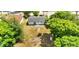 The yard is overgrown, and needs some TLC, but you can see the roof is in good shape at 3397 Janet St, Apopka, FL 32712
