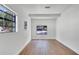 Bright bedroom featuring a large window and wood flooring offering a spacious and airy ambiance at 3397 Janet St, Apopka, FL 32712